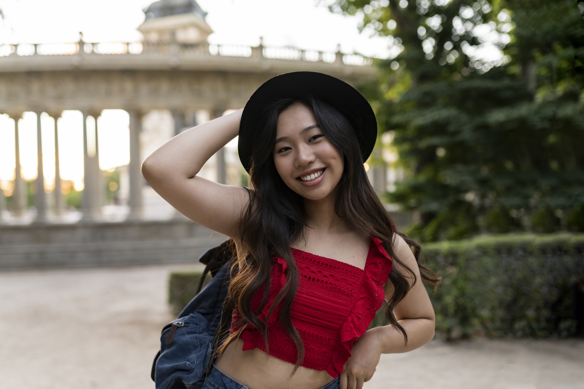 Asian woman backpacker traveler - Japanese woman with hat traveling in Europe -